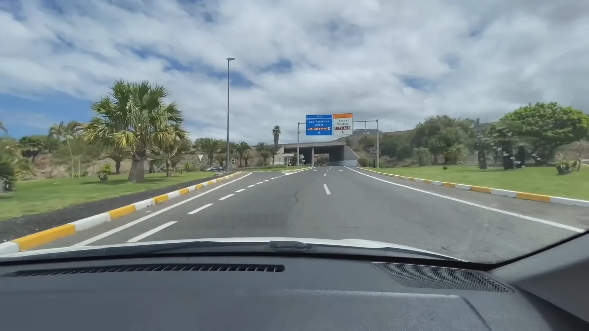 Joining the motorway with clear blue and white signage