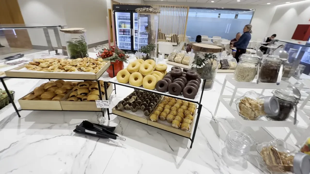 Tray of pastries and doughnuts on the breakfast buffet at Tenerife South VIP lounge.